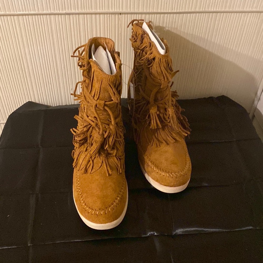 Moccasin boots sized 11 womens shoes